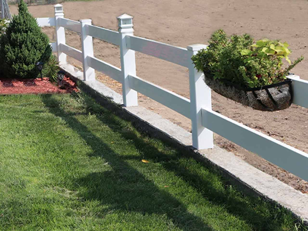 Residential ranch rail fencing with post light
